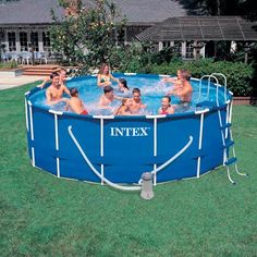 an above ground swimming pool with people in it