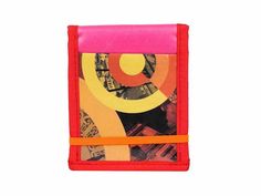 a small wallet with an abstract design on the front and side, in bright colors