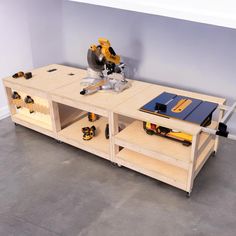 a workbench with tools on it in a room