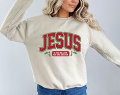 Christian Christmas Sweatshirt, Jesus Is The Reason For The Season, Religious Christmas Sweater, Cute Jesus Sweater, Womens Christmas Hoodie Welcome to our store! Our sweathirts are made from high-quality cotton and come in various sizes and colors. If you have any questions or special requests, please feel free to contact us. We hope you enjoy browsing our shop and find something you love! FEATURES Comfortable and Relaxed Sweatshirts Since our products are custom-made to your personal preferences, returns or exchanges are not possible. Please carefully review our size and color charts before placing your order. If you need assistance, feel free to reach out to us. Product Specifications 8 oz./yd² (US) 13.3 oz./L yd (CA), 50/50 cotton/polyester, 20 singles The Heavy Blend collection is now Jesus Sweater, Womens Christmas, Christmas Hoodie, Religious Christmas, Sweater Cute, Christian Christmas, Christmas Hoodies, Sweater Womens, Fine Yarn