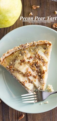 a piece of pecan pear tart on a plate with a fork