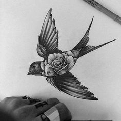 a drawing of a bird flying with a rose on it's back end and wings