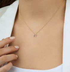 "14K SOLID YELLOW GOLD DAINTY INITIAL NECKLACE WITH DIAMONDS Metal : 14K Solid Gold Necklace Length : 16 inches / 40cm Letter Height : 7.00mm Letter Width : 7.50mm Diamond : 15 Diamonds --- Nice White Color Sparkle Diamonds ---- G color SI2 clarity Total Carat: 0.08ct to 0.12cts (Depending on the letter) ---MADE IN USA--- ---All letters from A to Z are available. Please indicate your letter choice in the \"notes to seller\" section on the order. ---This is a beautiful 14K Solid White Gold Dainty Letter N Pendant Gold, N Initial Necklace, N Necklace, Layering Diamond Necklaces, Diamond Necklace Simple, Gold Initial Pendant, Dainty Initial Necklace, Diamond Initial Necklace, Gold Letter Necklace