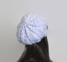 This is made to order. Crocheted with soft chunky acrylic yarn. Buttons may vary depending on availability. Hand wash is recommended. White Crochet Hat, One Size Fits All, White Chunky Knit Beanie Hat, White Adjustable Hat In Acrylic Yarn, Winter White Crochet Hat In Acrylic, White Acrylic Crochet Hat For Winter, Adjustable White Hat, White Adjustable Acrylic Yarn Hat, White Acrylic Yarn Hat One Size, White Hand Knitted Beanie Hat