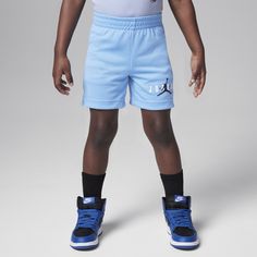 These basketball shorts are classic hoop style made of breathable mesh for a comfy feel that moves with kiddos at play. The stretch waistband helps them get a fit that's just right, and pockets provide spots to secure small items like cash or keys. Sporty Bottoms With Built-in Shorts For Playwear, Casual Basketball Athletic Shorts, Casual Cotton Athletic Shorts For Basketball, Casual Blue Basketball Shorts, Casual Moisture-wicking Shorts For Basketball, Breathable Blue Sports Shorts, Blue Breathable Shorts For Sports Events, Casual Blue Basketball Athletic Shorts, Breathable Blue Shorts For Sports Events