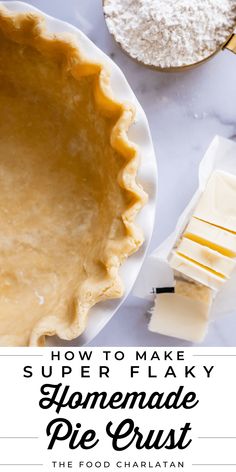 an uncooked pie crust next to butter and other ingredients on a marble table