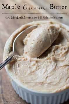 a spoon in a bowl filled with peanut butter on top of a wooden table and text overlay that reads maple cinnamon butter