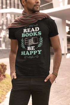 a man wearing a t - shirt that reads read books be happy