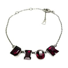 A striking Vintage Dior Letter Bracelet. Featuring stunning red Swarvoski crystal D I O R cut out letters in a gunmetal tone setting with fine chain attached. Finished with a lobster clasp and signed Dior hangtag. In very good condition. Adjustable fastening ranging from 16cm to 21cm long. This is a wonderful piece of Christian Dior heritage from the Galliano era that totally rocks. Should you choose to buy from us, we commit to the item being as described. Your vintage costume jewellery will ar Luxury Vintage Clothing, Christian Dior Jewelry Vintage, Red Jewerly, Red Jewellery, Cut Out Letters, Vintage Jewlery, Red Bracelet, Dior Vintage, Vintage Christian Dior