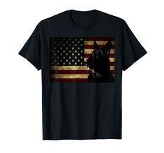 a black german shepherd dog in front of an american flag t - shirt