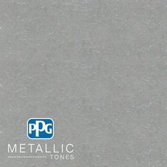 the logo for metallic tones is shown on a gray background with blue and white letters