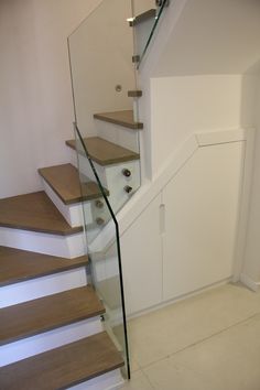 there is a glass railing on the stairs