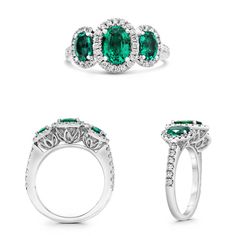 three different emerald and diamond rings