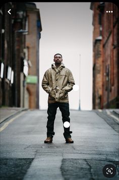 a man standing in the middle of an empty street