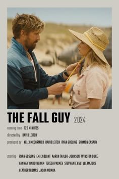 the fall guy movie poster with man and woman in cowboy hats looking at each other