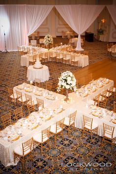 an overhead view of a banquet hall with tables and chairs set up for formal function