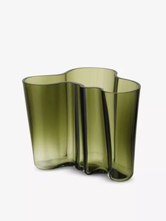 three green vases sitting next to each other