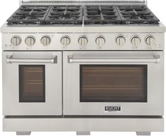 an oven with four burners and two doors on each side, in stainless steel