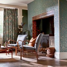 a living room filled with furniture and a fire place