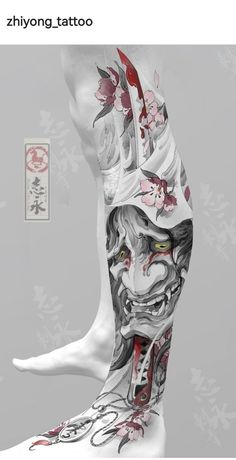 an artistic tattoo on the back of a person's leg