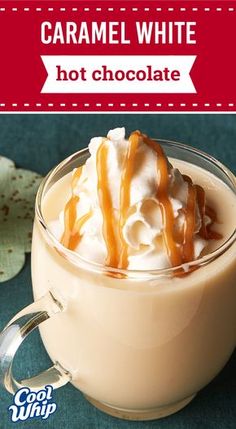 caramel white hot chocolate in a glass mug with whipped cream and caramel drizzle