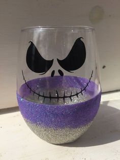 a wine glass painted to look like jack skellingy