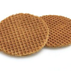 two waffles sitting on top of each other in front of a white background