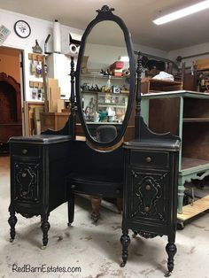 an antique vanity and mirror in a shop