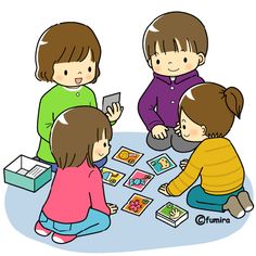 children playing with cards on the floor