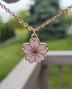 This necklace has a cute Sakura (cherry blossom) charm.  The charm measures 7/8" wide.  *Choose your flower color and necklace length that check out. The chain is stainless steel.  This will be sent to you in a gift bag or box. This is perfect for anyone! Birthdays, anniversaries, jewelry for bridesmaids, gifts for Mom, or any other occasion. Please contact me if you have any custom requests or questions. Shipping is typically 4 to 6 days in the US, Or you can upgrade to Priority (2 to 3 days) o Sakura Necklace, Cherry Blossom Necklace, Japanese Sakura, Sakura Flower, Sakura Cherry Blossom, Gift Flower, Bridesmaids Gifts, Pretty Jewellery, Flower Necklace