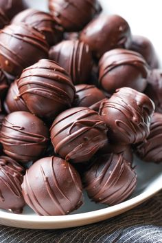 a plate full of chocolate candies on a table