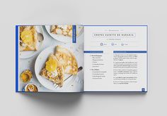 an open cookbook with food on the cover and in it's pages is shown