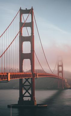 the golden gate bridge in san francisco, california is pictured on a foggy day