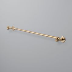 This towel rail is crafted from solid metal, showcasing a distinctive rough-cast knuckle and a hand-polished solid metal bar. Each knuckle is unique due to the casting process. With a durable brass PVD finish, this product is ideal for various interior spaces, including bathrooms. Clean only with mild dish soap diluted in warm water. Cleaning chemicals may damage the finish. All finishes are subject to aging Returns of this product will be subject to a manufacturer restocking fee. Please note, due to the durable EPL wet-rating treatment, the CAST brass differs slightly in appearance from the CROSS + LINEAR brass finishes. Specifications Material Brass finish: Brass 9-7/8" Width: 11-13/16" (300mm)Projection: 3-5/16" (84.5mm)Height: 2-1/4" (57.5mm)Center to Center: 9-7/8" (250mm)Plate Diamet Hardware Tape, Shower Door Handles, Bathroom Towel Rails, Buster Punch, Cookbook Holder, Shop Cabinets, Lighting Gifts, Sliding Door Hardware, Liquid Hand Soap