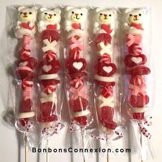 several lollipops in the shape of teddy bears