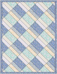 a blue and yellow quilt with squares on it