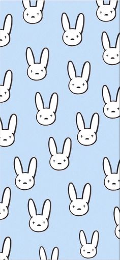 a blue background with white rabbit heads on it's face and the bottom half of their ears are drawn