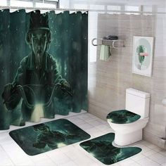 the shower curtain and rugs are decorated with green artwork