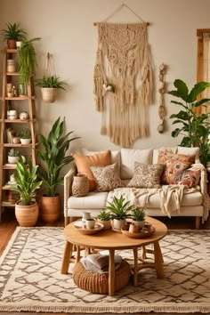 a living room filled with lots of plants and furniture