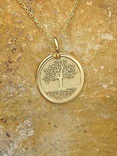 "14k Solid Gold Tree of Life Pendant, Personalized Tree Of Life Necklace, Nature Inspired Jewelry, Family Tree Pendant, Tree Pendant 14k Solid Gold Choose What Size You Want the Pendant Using The First Option Box Choose If you Want Thinner, Thicker  Or Without Chain Using The Second Option Box Photos Are For The 0.5 inch Diameter Pendant Pendant thickness : 0.5mm  Contact us if you want it thicker Inner diameter of jump ring : 4mm Contact us if you need it bigger              No1 chain width : 0.87mm                 No2 chain width : 1.30mm     ♥  Material of pendant and chain: Solid Gold k14  ♥  Packaging: All of our jewelry are beautifully boxed and ready for gifting For more personalized designs take a look here: ♥ www.etsy.com/listing/736955132 ♥ www.etsy.com/listing/819494857 ♥ www.et Gold Nickel-free Necklace For Memorial, Sterling Silver Yellow Gold Tree Of Life Necklace, Yellow Gold Sterling Silver Tree Of Life Necklace, Round Etched Jewelry For Memorial, Tree Of Life Round Pendant Jewelry For Anniversary, 14k Gold Tree Of Life Pendant Jewelry, Symbolic Gold Jewelry With Tree Of Life, Round Etched Necklaces For Commemoration, Etched Necklaces For Commemoration