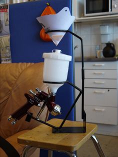 a coffee maker sitting on top of a wooden table