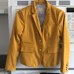 Brand New Condition. Yellow Blazer With Gold Buttons. Striped Interior Lining. Tailored Yellow Outerwear For Office, Classic Yellow Blazer For Office, Casual Yellow Blazer For Work, Tailored Yellow Blazer, Tailored Long Sleeve Yellow Blazer, Casual Yellow Outerwear For Office, Classic Single-breasted Yellow Blazer, Yellow Fitted Blazer For Work, Classic Yellow Fall Blazer