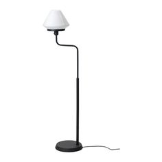 a black floor lamp with a white shade on the base and a corded light