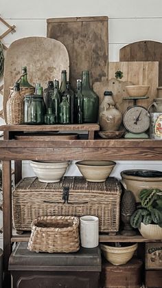 the shelves are filled with baskets and other items