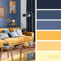 a living room with blue walls and yellow furniture in the color scheme, including mustard