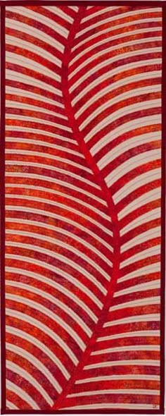 a red and white striped wall hanging