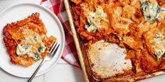 a casserole dish with spinach and cheese on it next to a plate