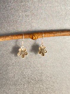 Looking for the perfect earrings to add a touch of bohemian style to your outfit? These Flower Earrings are just what you need! Handmade with delicate flowers, these dainty earrings are the epitome of minimalistic chic. The dangle design adds a playful touch, making them the perfect gift for her. Whether you're dressing up for a special occasion or keeping it casual, these earrings will elevate any look. So go ahead and treat yourself, or someone special, to these beautiful handmade earrings. Minimalistic Chic, Delicate Flowers, Earrings Bohemian, Earrings Dainty, Earrings Minimalist, Bohemian Earrings, Dainty Earrings, Boho Stil, Delicate Flower