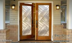 the front door to a house with two glass doors