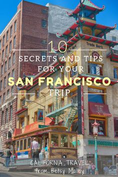 the san francisco travel guide is shown in front of a tall building with a red roof